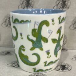 Mug - Nessie front view Mug - Nessie The Loch Ness Monster Collage Mug